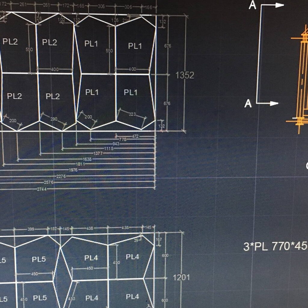 Technical CAD drawing showing nested plate layouts (PL1, PL2) for reactor fabrication.